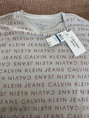 Calvin Klein Jeans Cream Tee with Mauve Logo Print